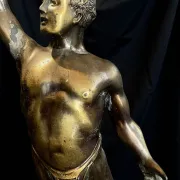 Antique bronze sculpture on a marble base, Roaring Twenties, around 1930.