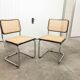 Pair of black Breuer b32 chairs and cannage