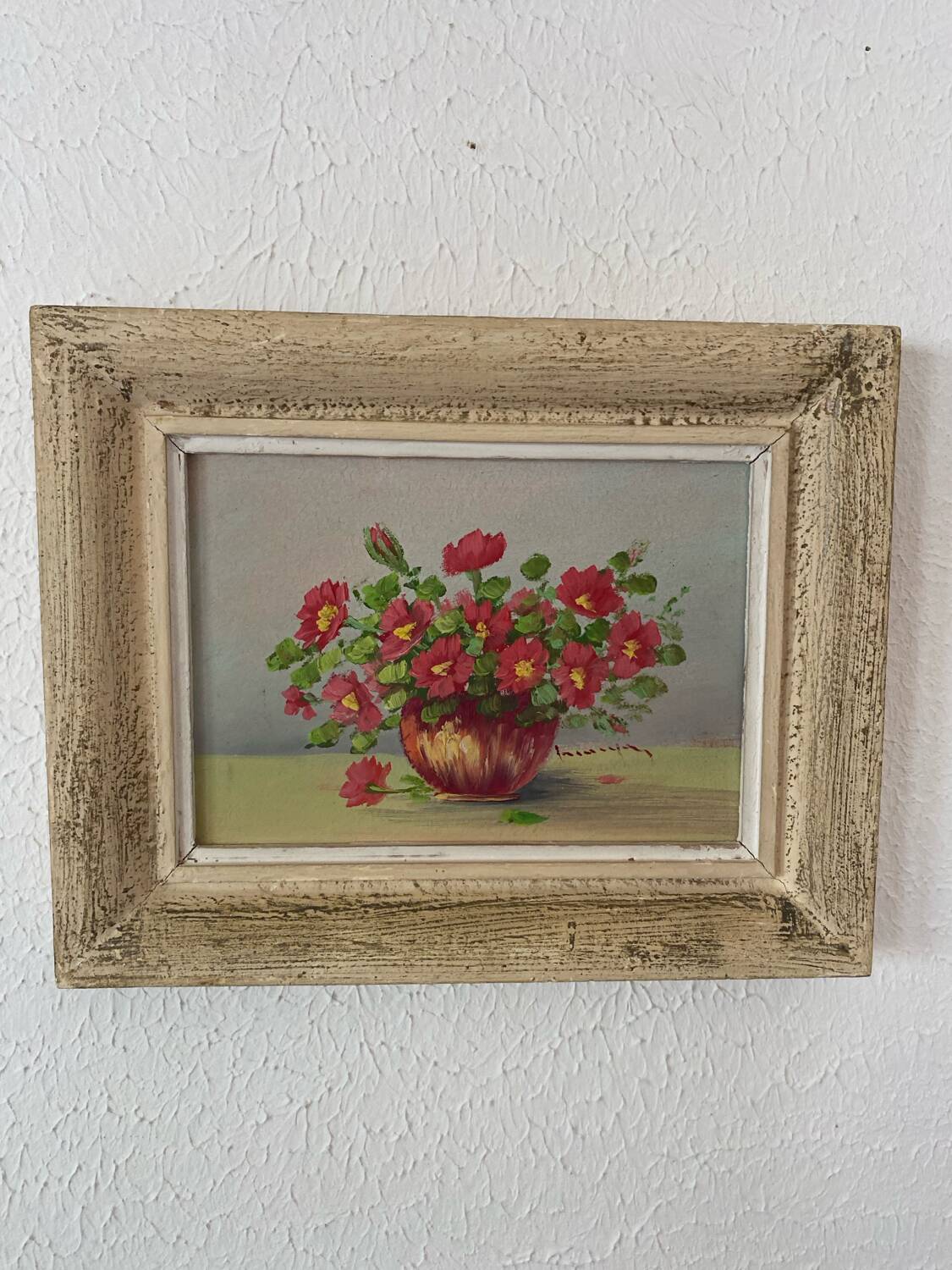 Oil painting red country flowers in a vase.
