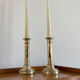 Pair of antique brass push candlesticks