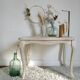 Old patinated coffee table and curved feet