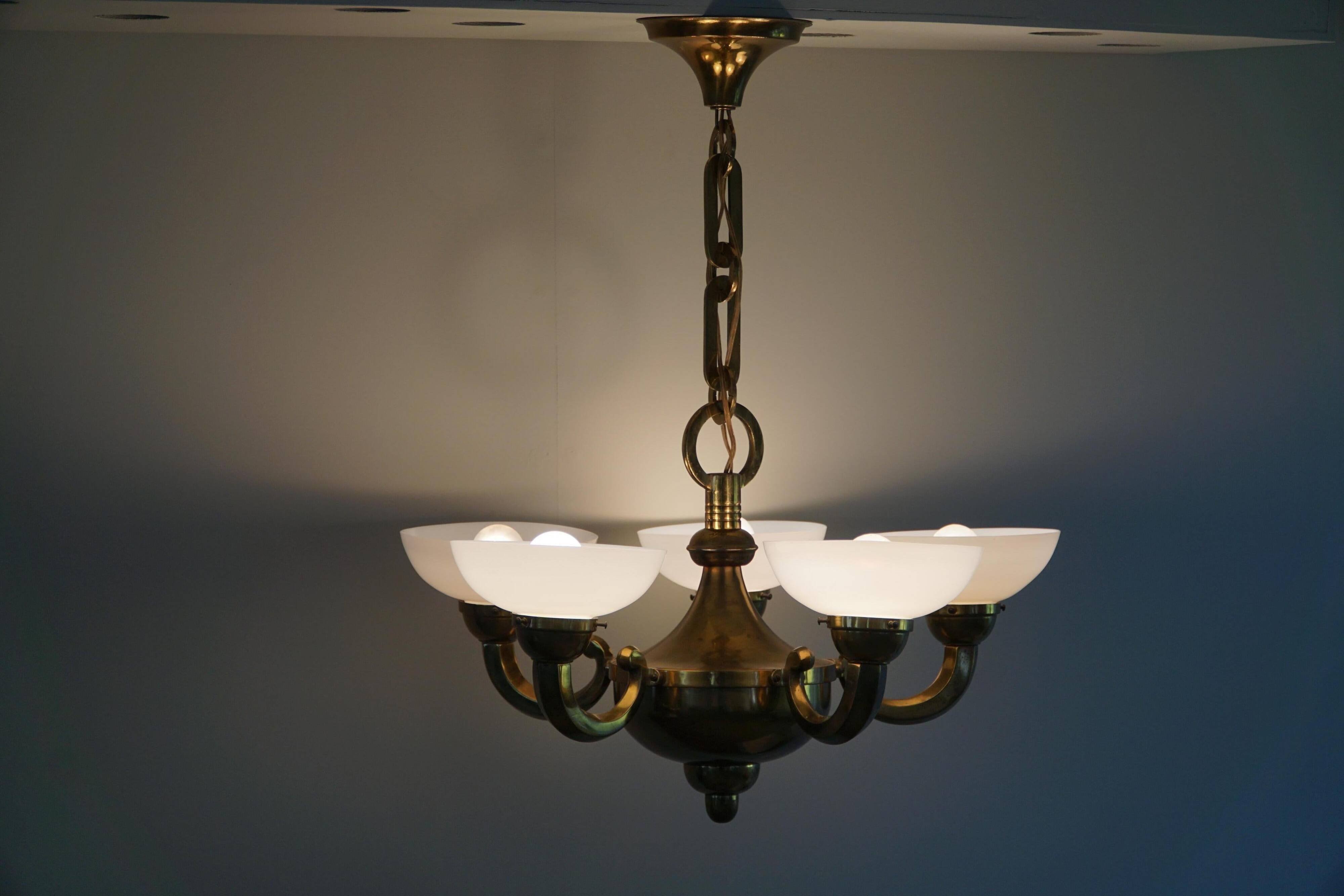 A modern Danish Art Deco chandelier, glass and brass, 1940s.