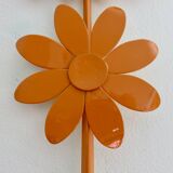 Large 1970s "flower" mirror in orange metal