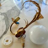 Pair of palm leaf wall lights in Hollywood Regency style with opaque globes by Hans Kögl, Germany, 1970s.