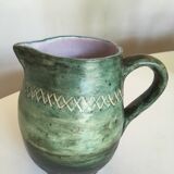 Incised glazed earth pitcher