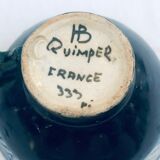 Two cups and two quimper milk jars