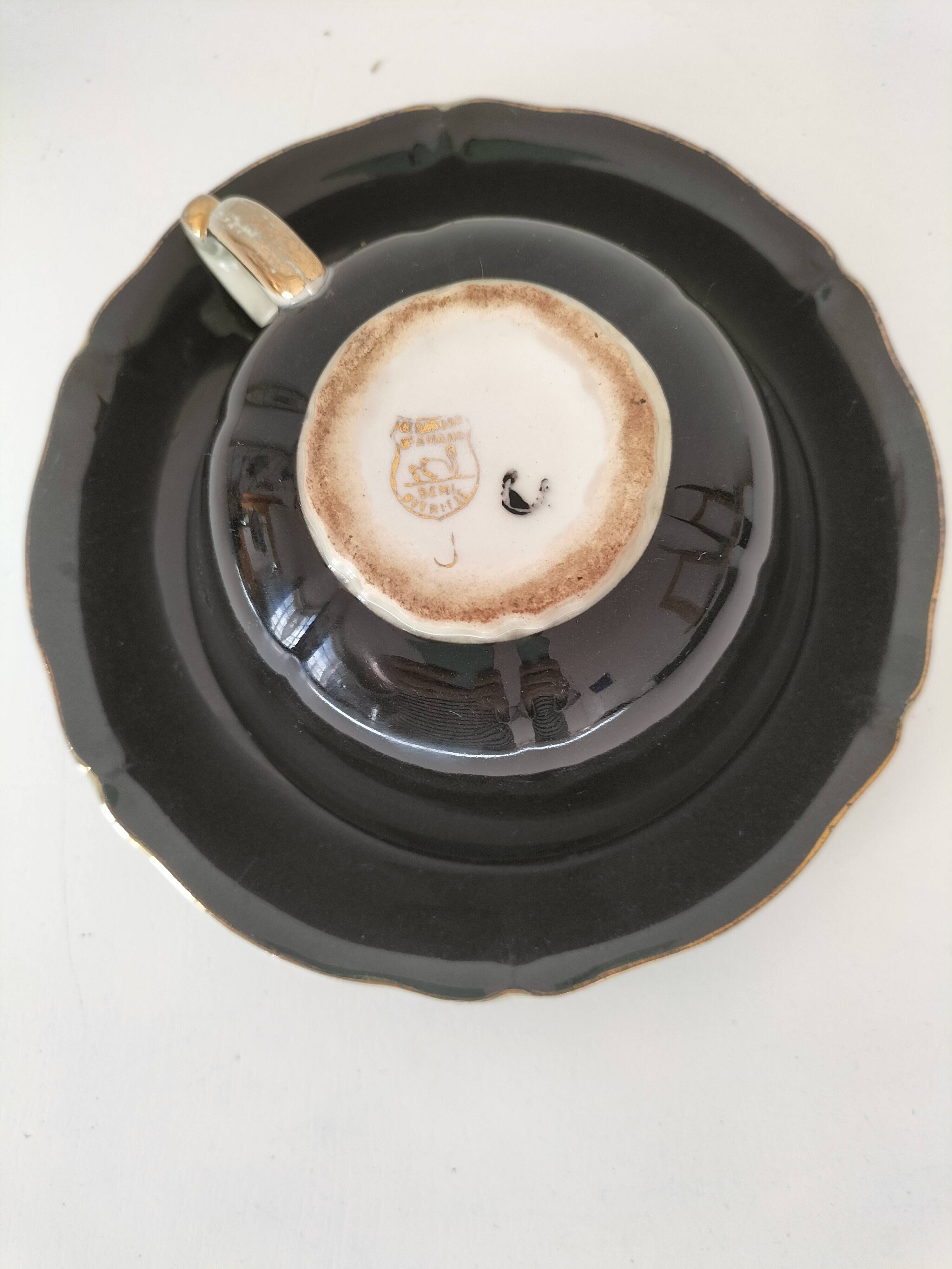 Large black, yellow iridescent and white Art Deco Saint-Amand cup.