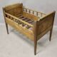 Antique children's bed from the 19th century.