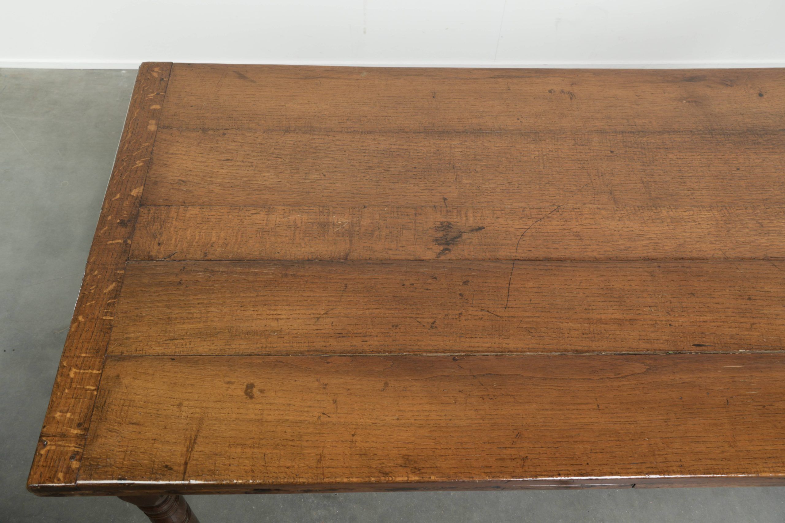 Antique oak dining table from the late 18th century with extendable leaves