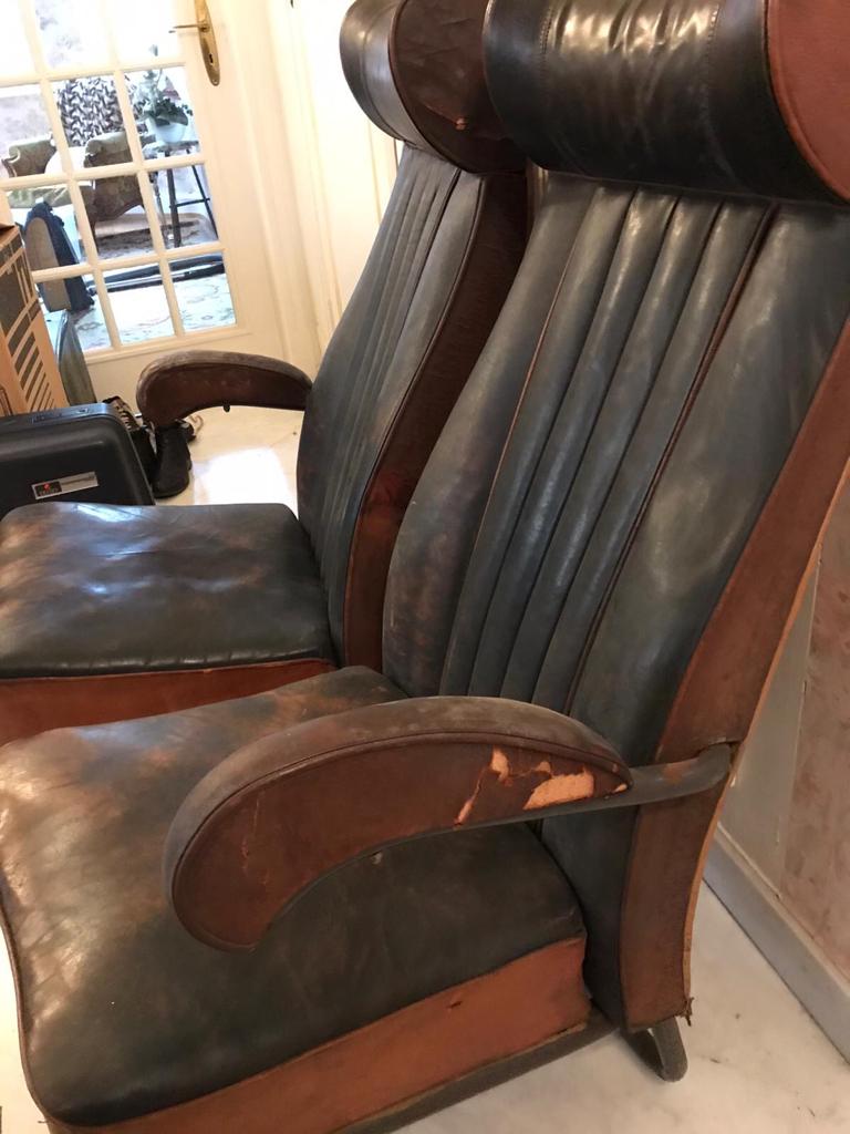 Vintage 1950s leather double-plane bus armchairs