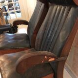 Vintage 1950s leather double-plane bus armchairs