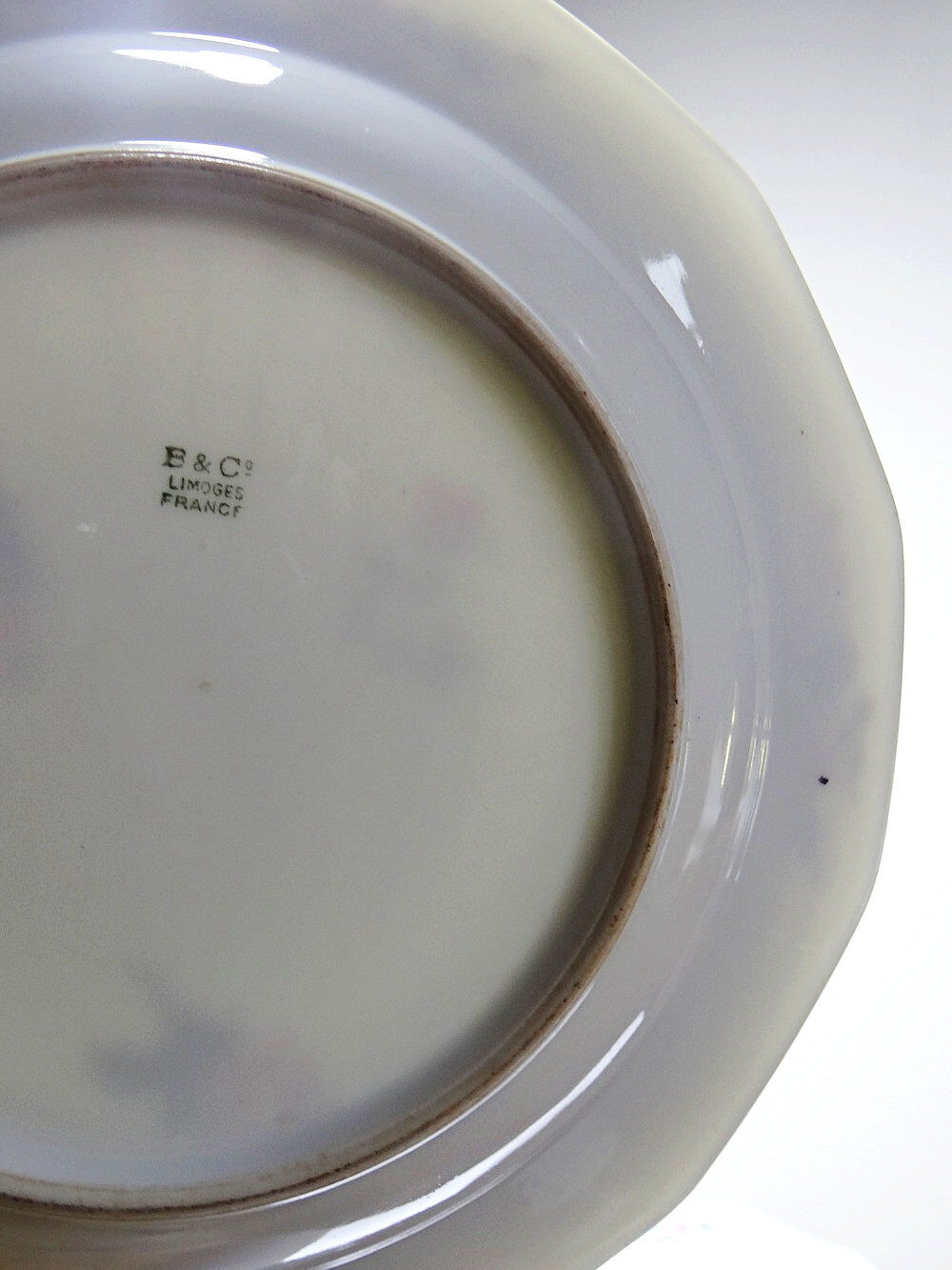 4 deep plates Bernardaud Limoges porcelain with floral decoration from the 1920s to 1950s.