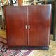 Meuble vintage musique placage acajou sur roulettes