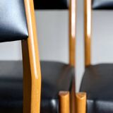 Set of 4 wooden and black leatherette chairs