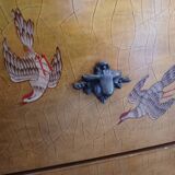 Gilded wooden chest of drawers with Asian decor and polished marble