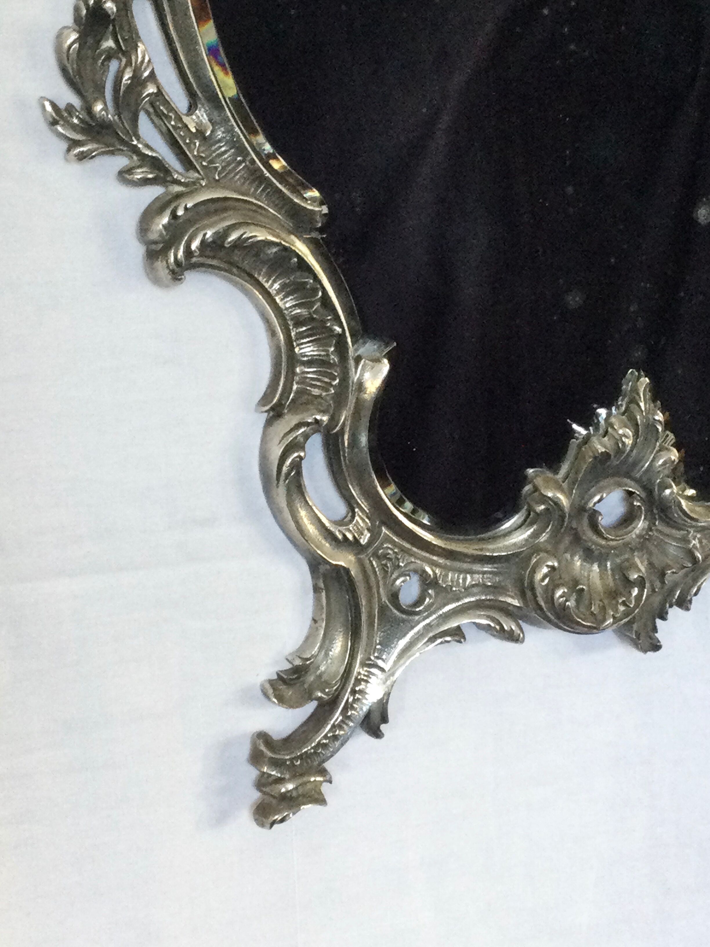 Nineteenth century mirror in silver bronze