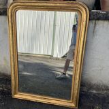 Large Louis-Philippe gilded mirror with gold leaf