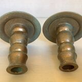 Pair of green and gold wooden candlesticks