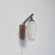 Danish wall lamp in teak with milk glass, 1960s