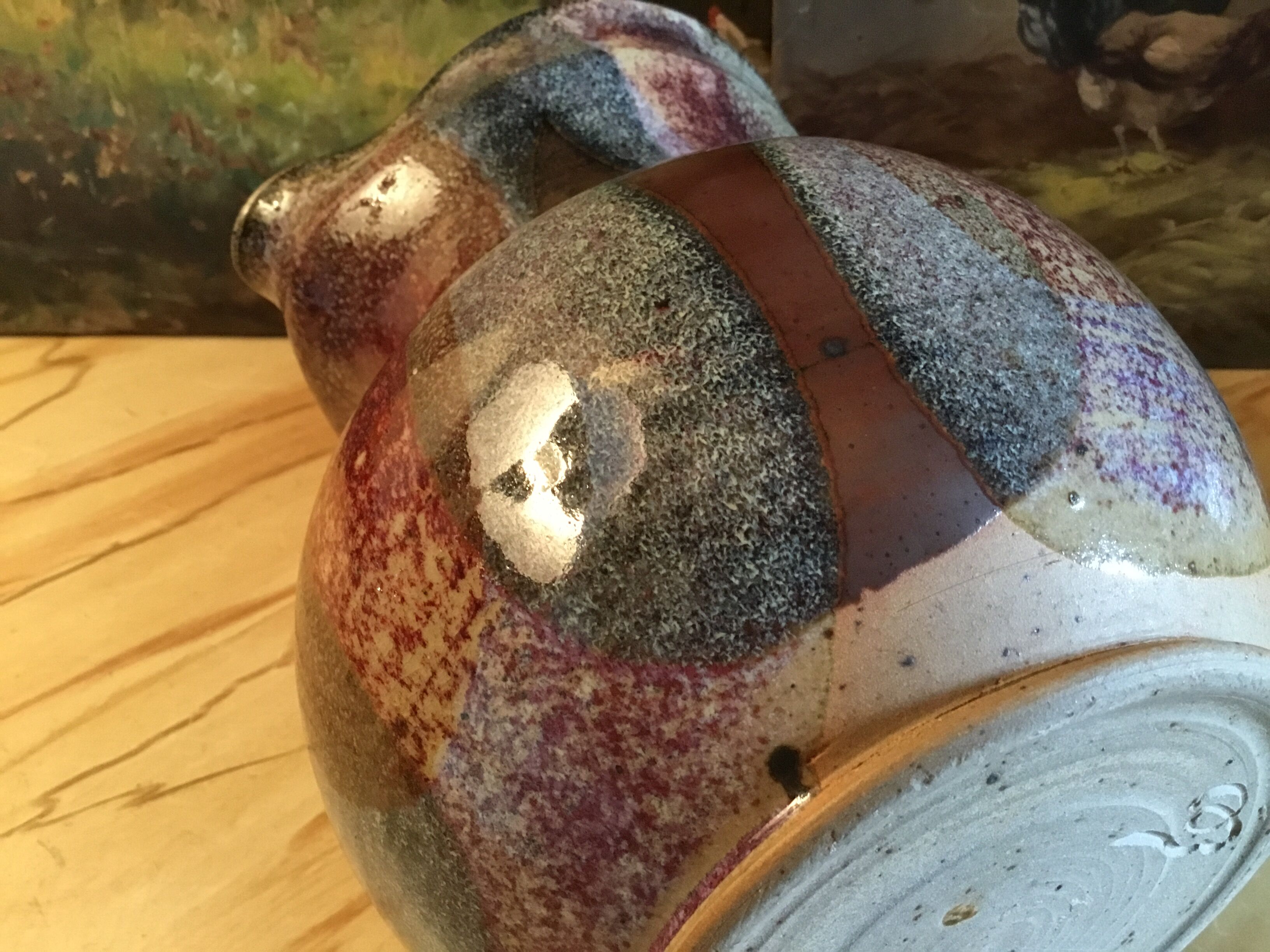 Signed varnished sandstone pitcher