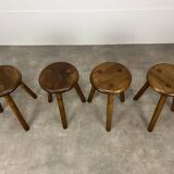 4 wooden tripod stools