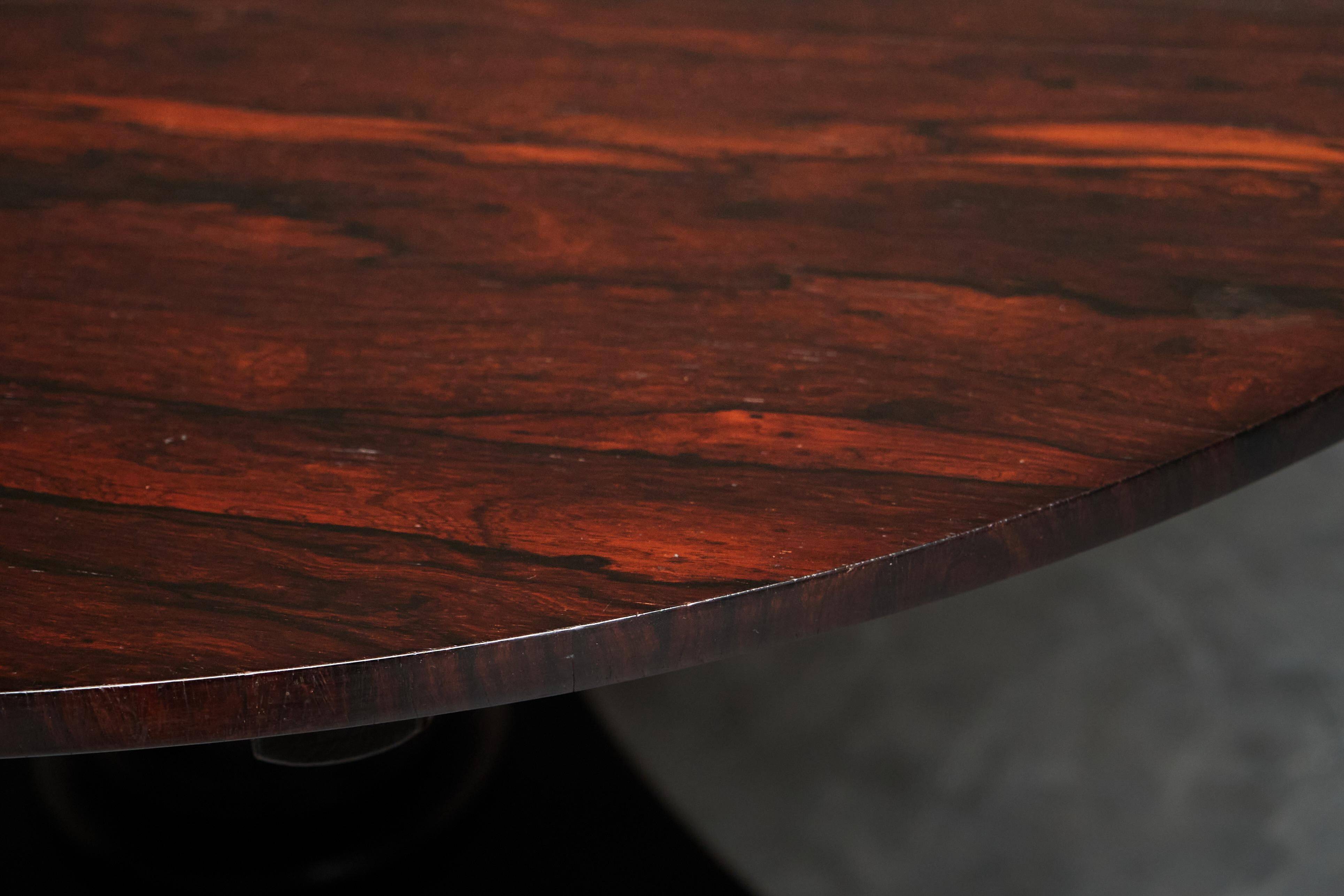 Empire dining table in rosewood veneer, 19th century.