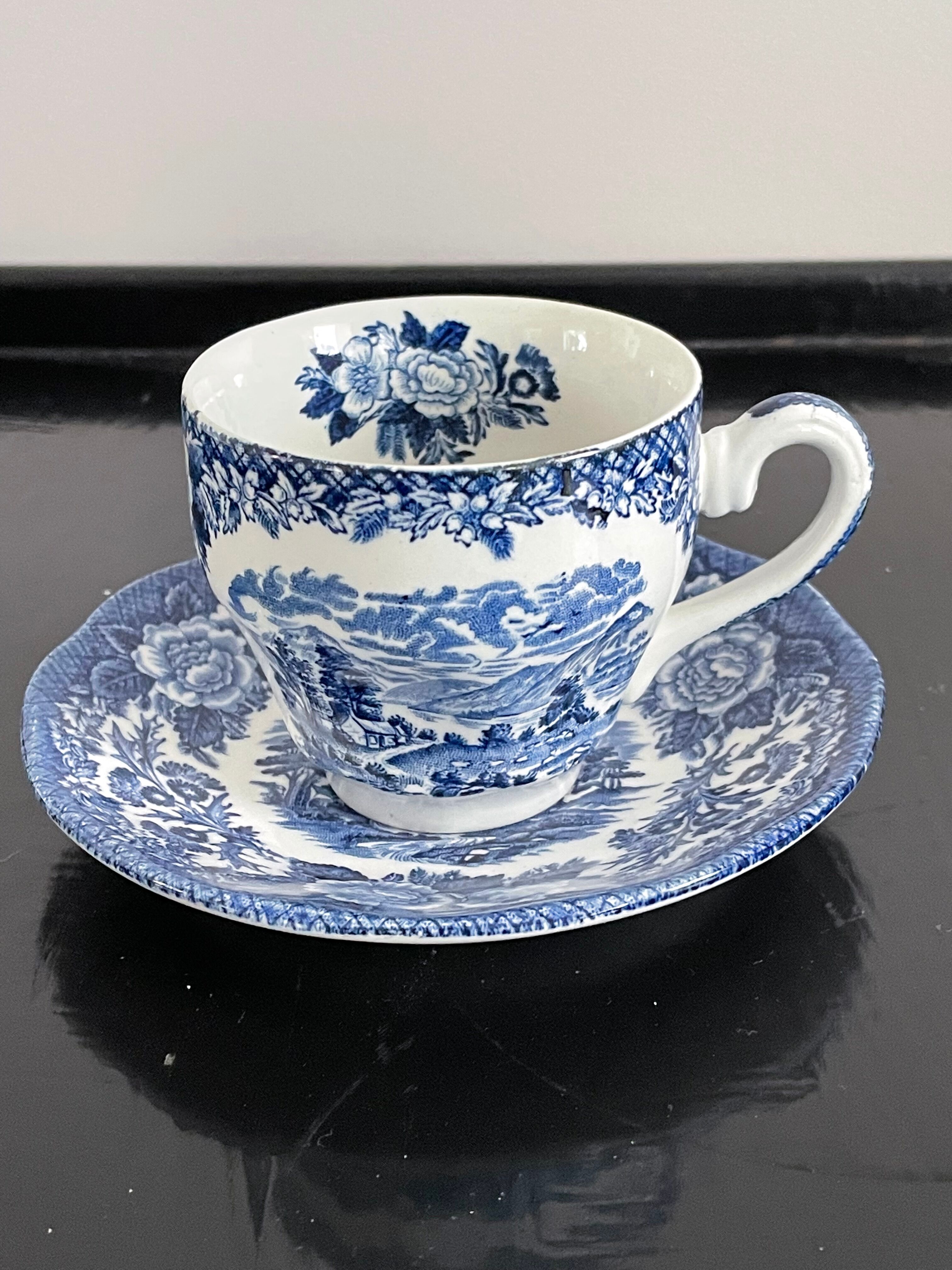 4 cups and under cups in English porcelain