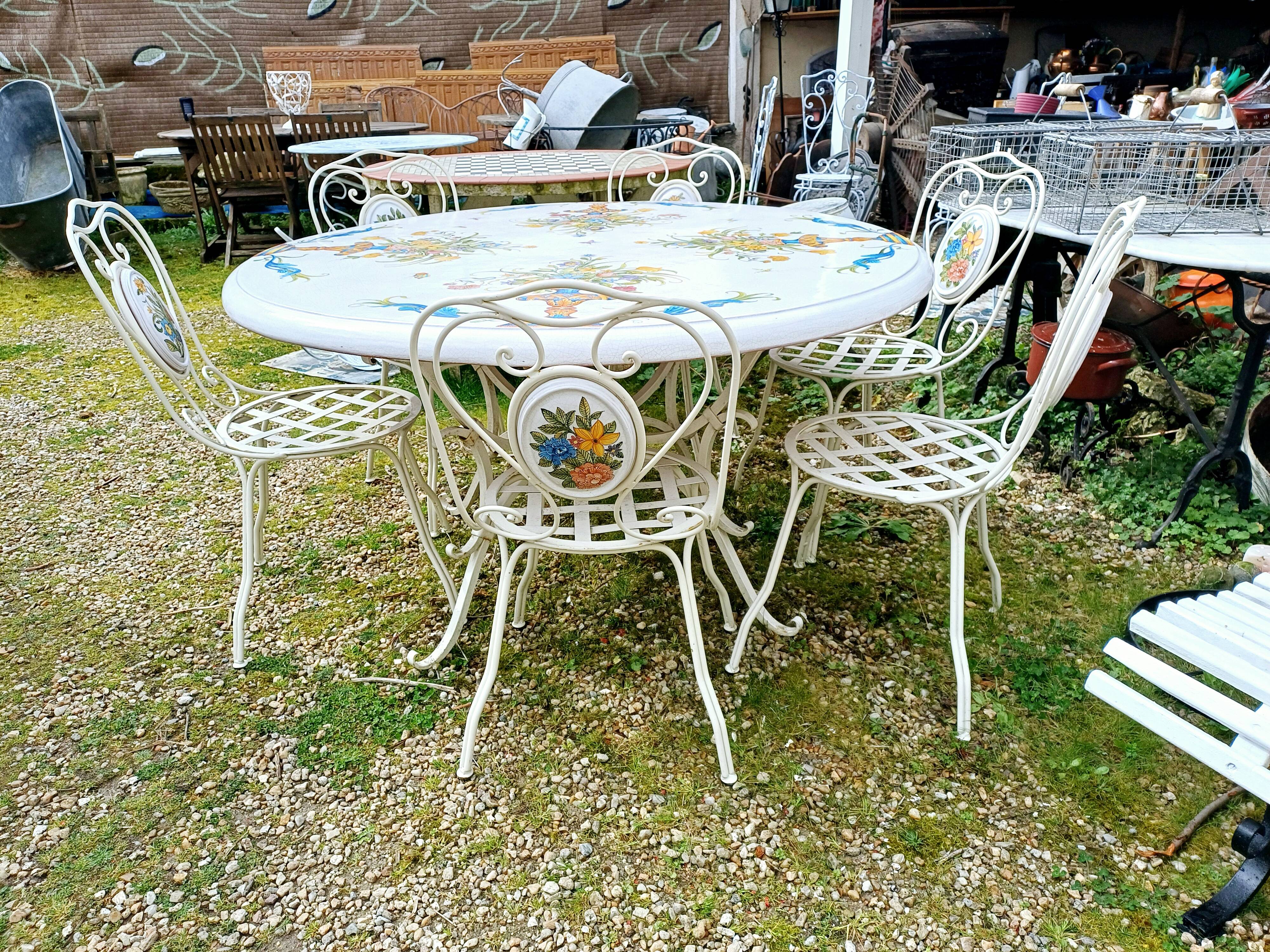 Garden furniture. Wrought iron and ceramic. Italian handcrafted.