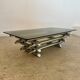 Table basse Space âge années 70 métal tubulaire et verre fumé design italien