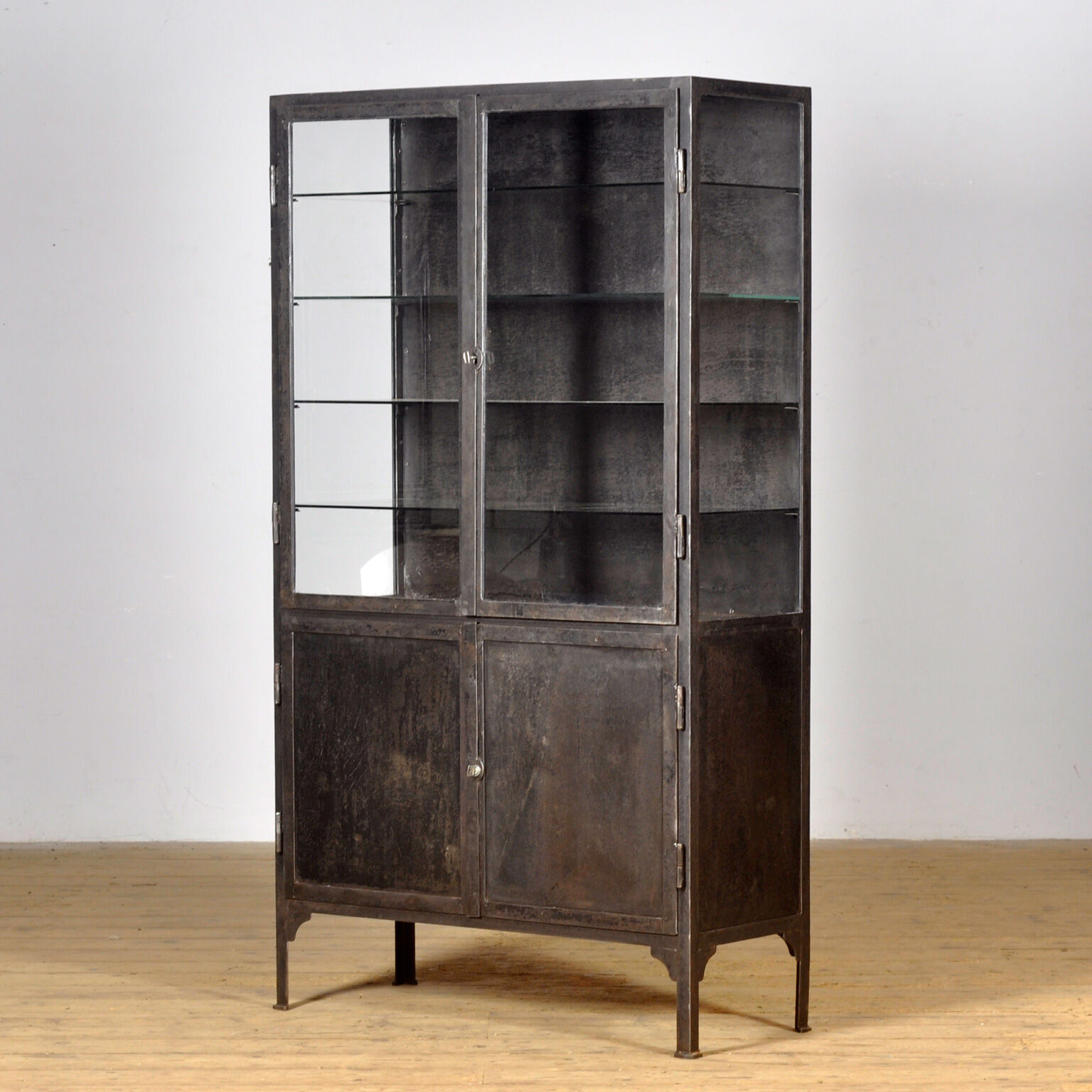 Polished iron medical cabinet, 1930s