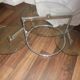 Glass coffee table with swivel tops circa 1980