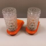 Bathroom lamps in a nice orange colour with a crystal glass shade and a base of hard thin plastic