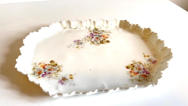 Old tray in floral pattern biscuit