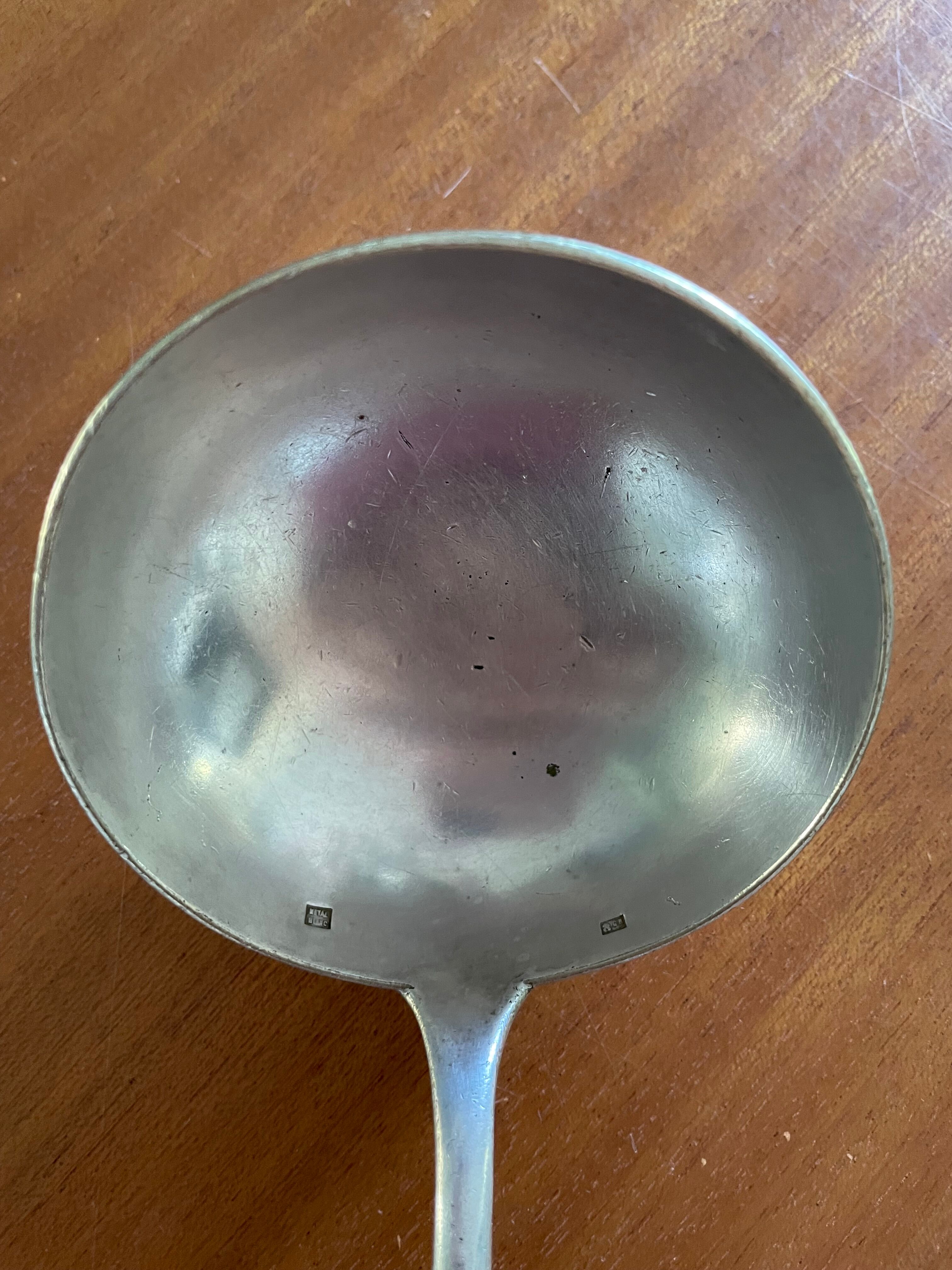 Silver metal ladle