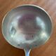 Silver metal ladle