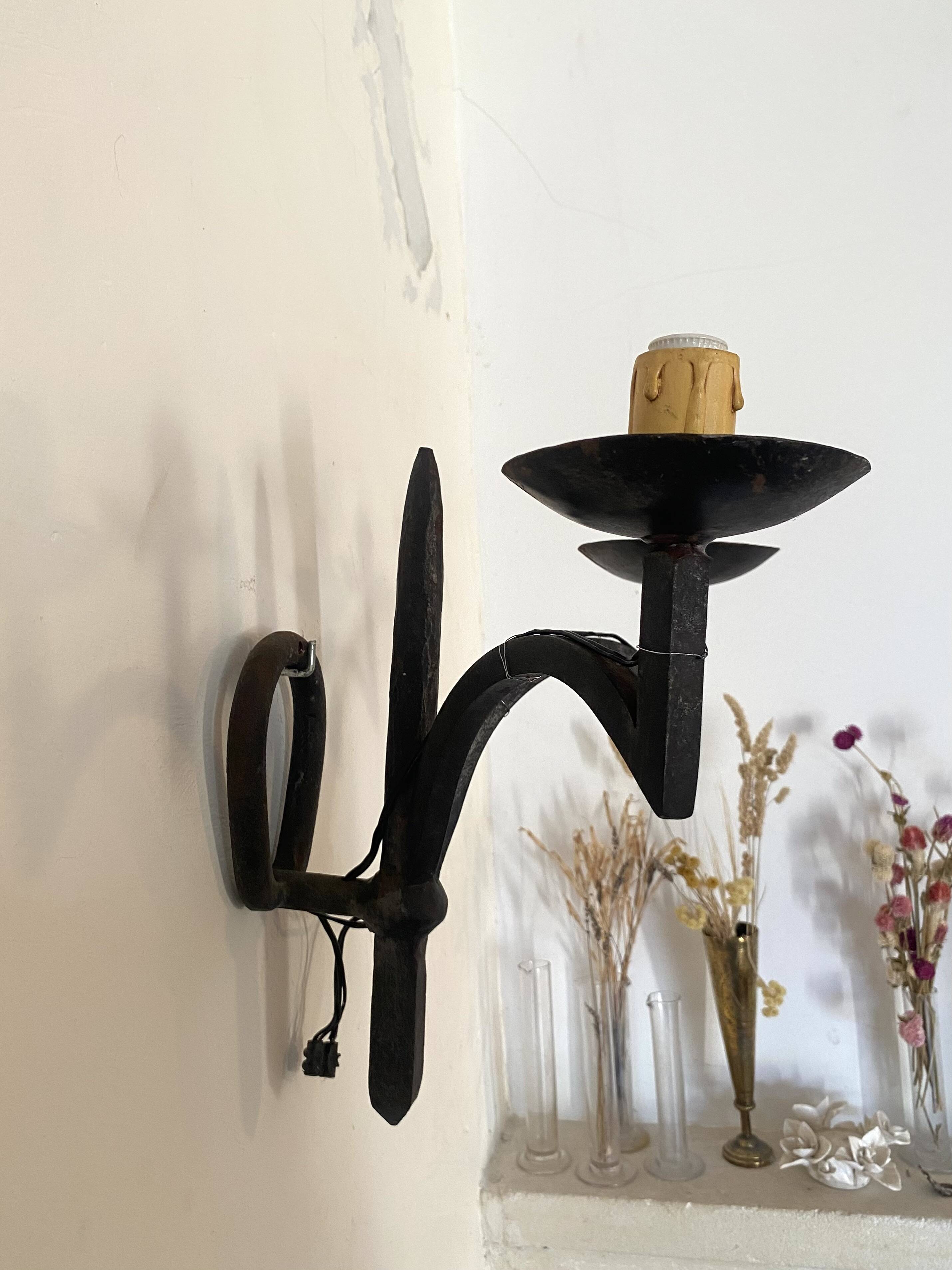 Wrought iron wall light with 2 lights