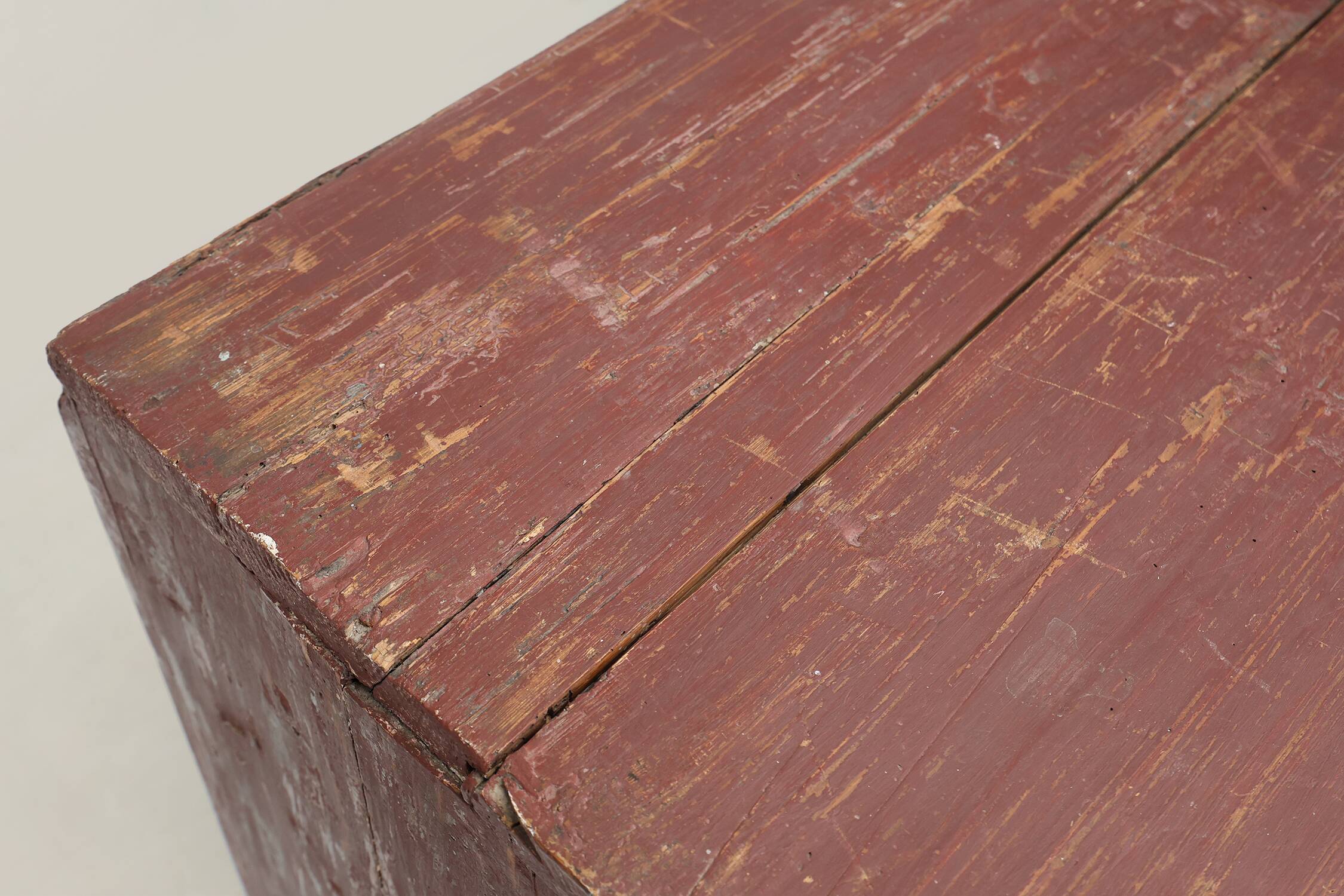 Rustic Parisian cabinet in pine wood with old burgundy paint layers, ca. 18