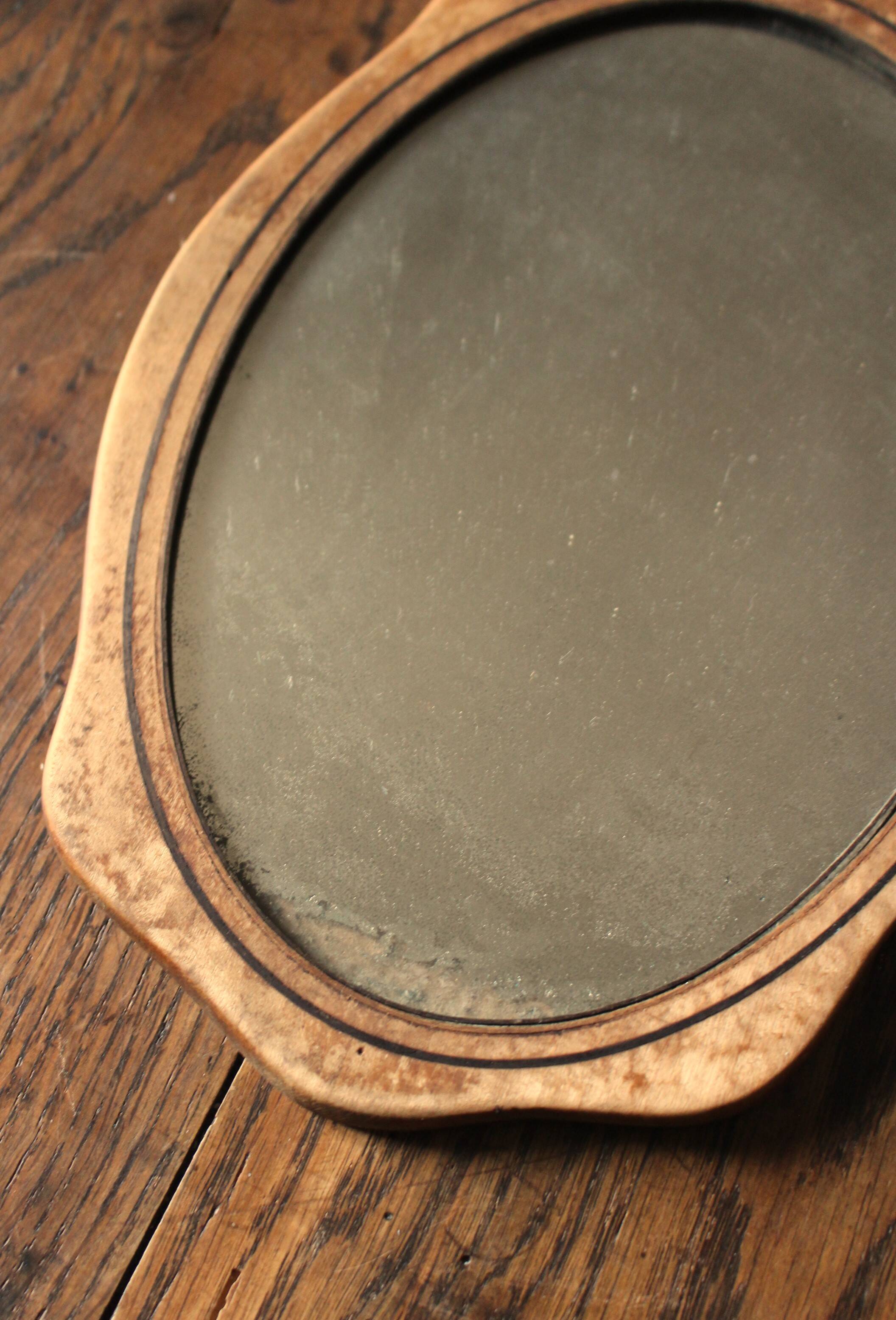 Small old wooden mirror
