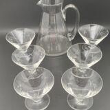 Glass and carafe set with chiseled flower motif