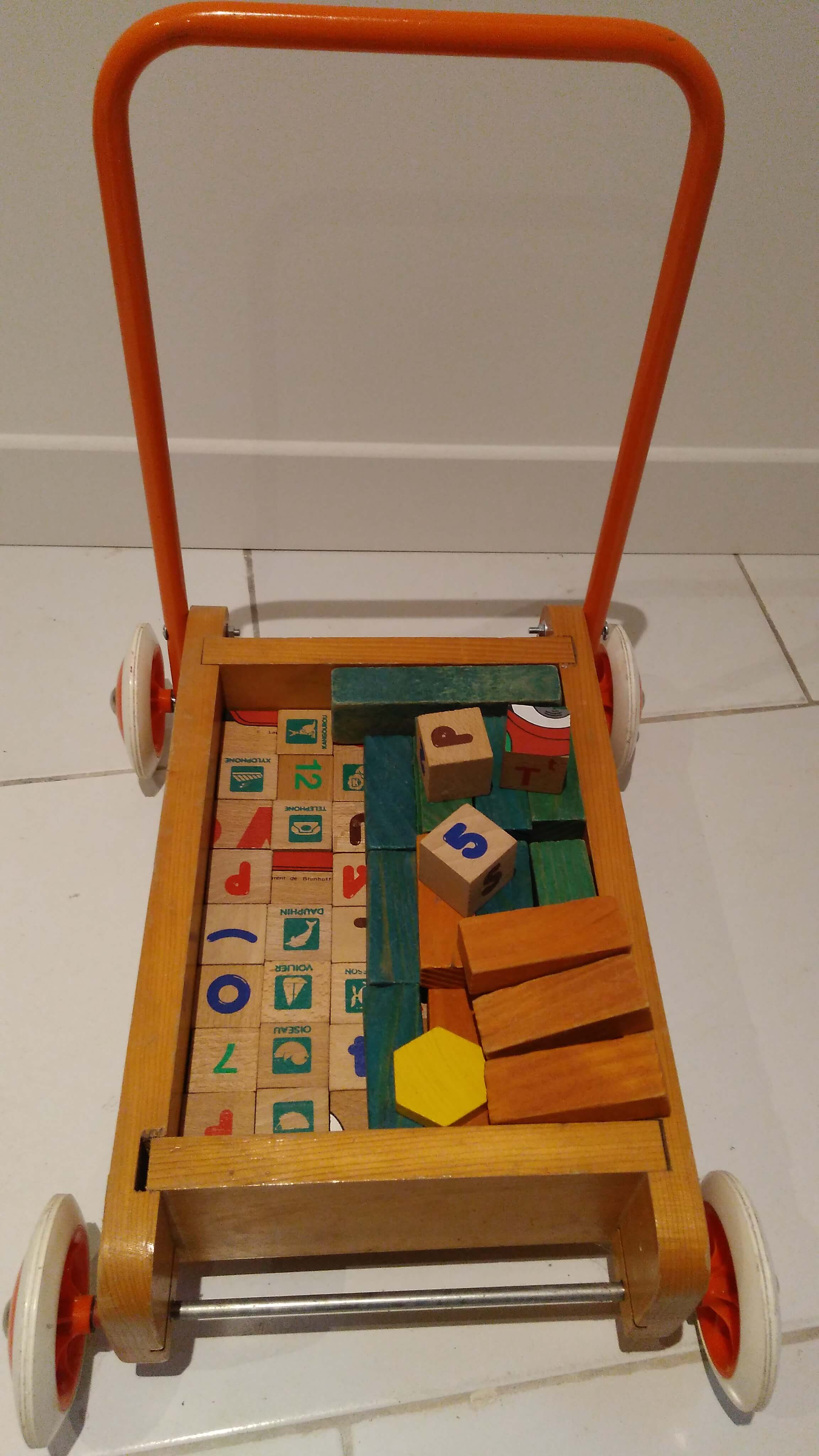 Educational game wood cubes on wheeled cart