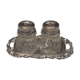 Salt and pepper and silver tray