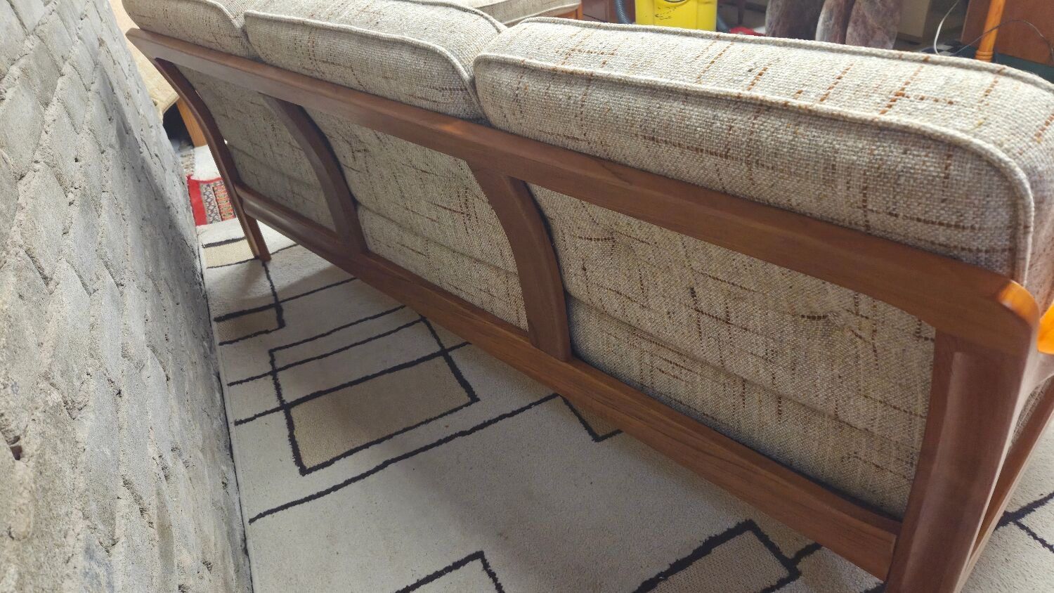 Danish canapé and its 1970s teak armchair