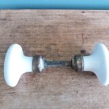 White porcelain door knob handles