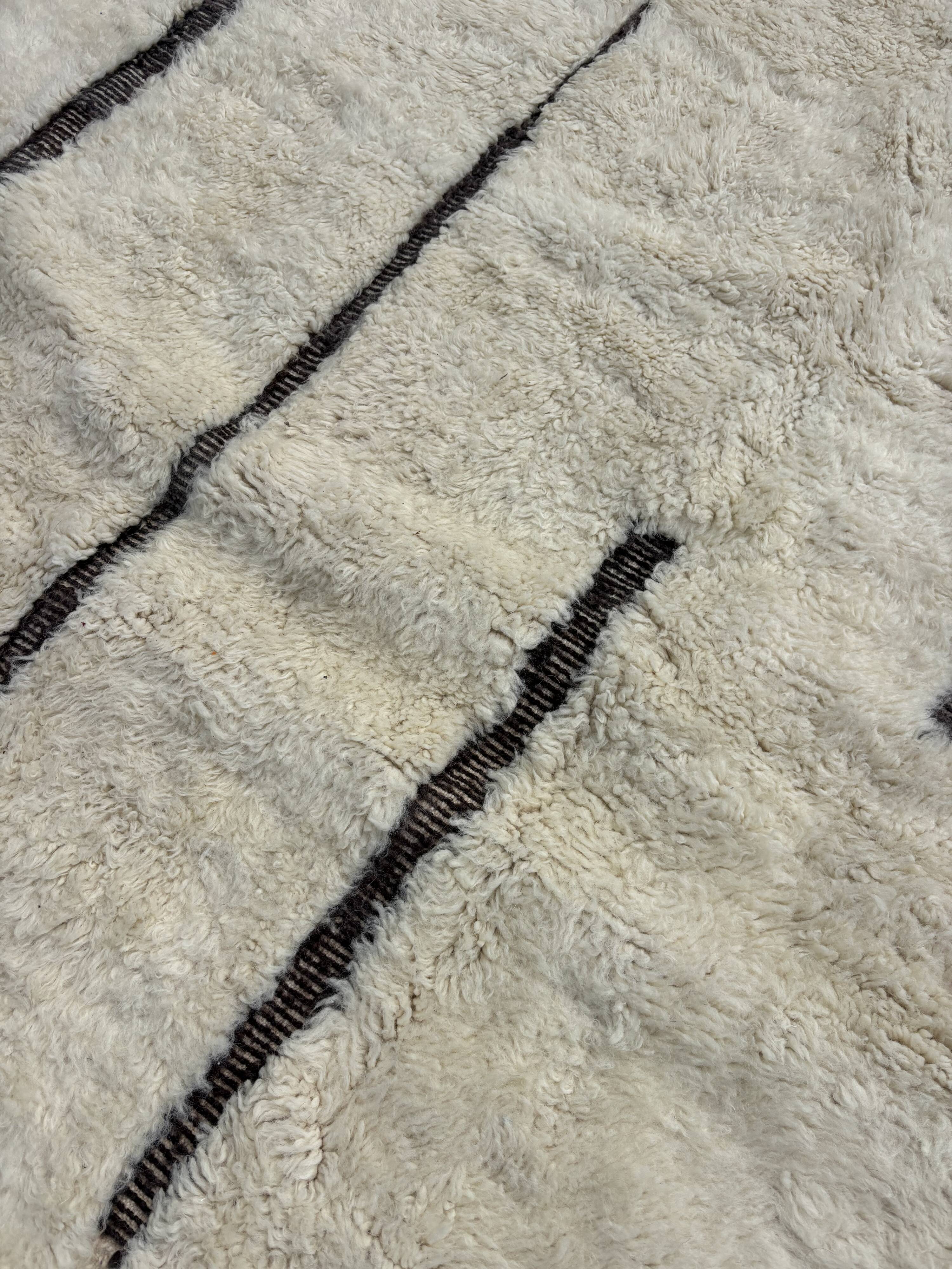 Large Berber M'rirt rug in cream and black wool, Moroccan rug.