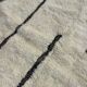 Large Berber M'rirt rug in cream and black wool, Moroccan rug.