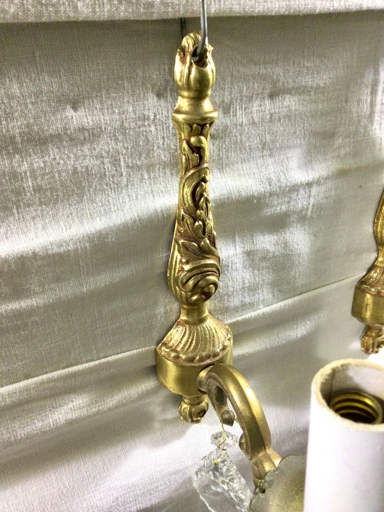 Pair of 1-light bronze sconces and Louis XV style stamps