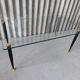 Glass and black metal coffee table