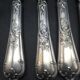 12 silver metal table knives model Rocaille