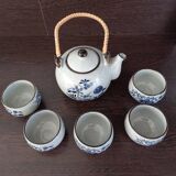 Tea service, teapot and five bowls in oriental style.