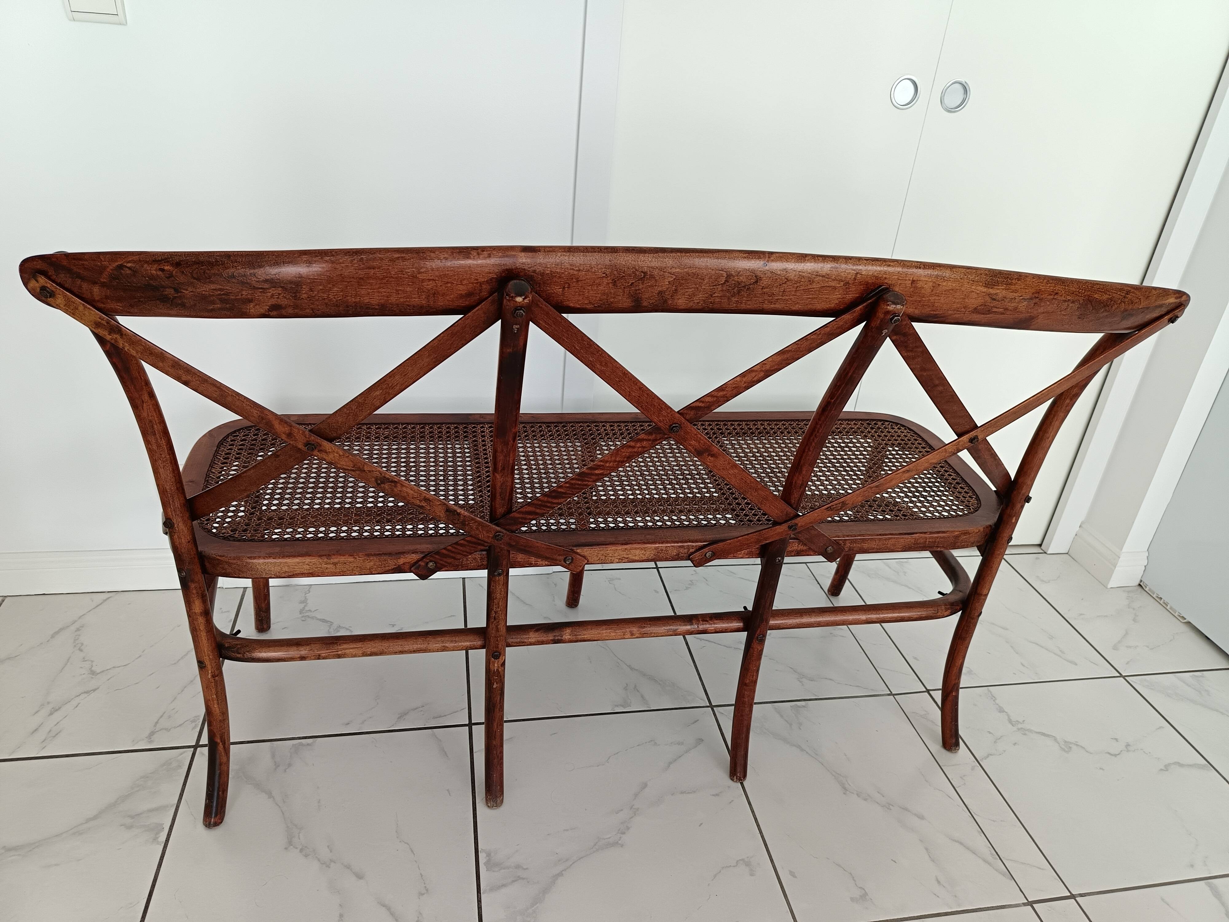 CURVED WOOD AND CANE BENCH